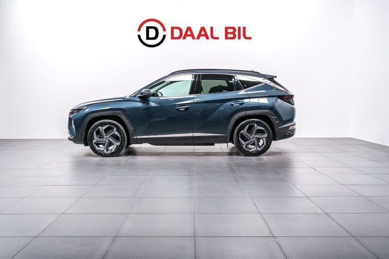 Blå Begagnad 2021 Hyundai Tucson Advanced SUV | 279 700 kr (Marknadspris) - Bild 1/4