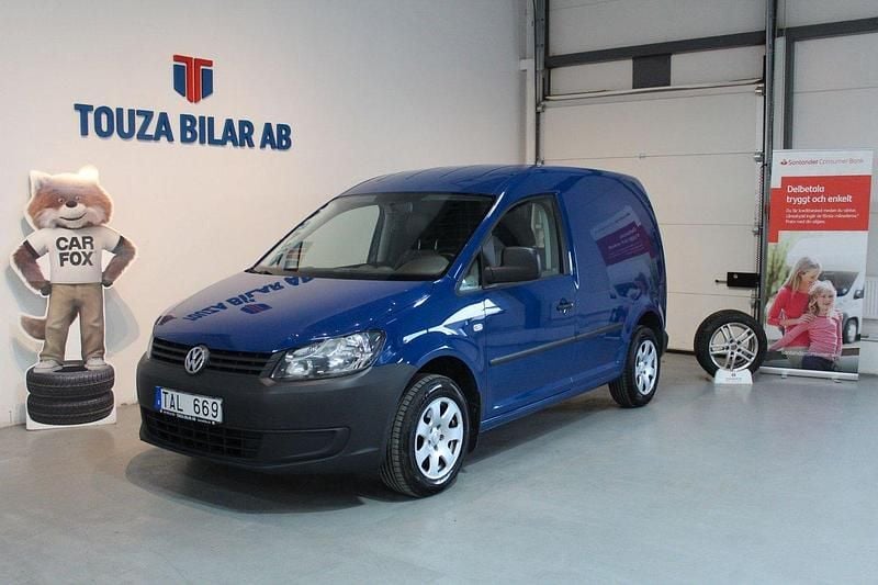 Mörkblå (blå) Begagnad 2012 VW Caddy Minibuss | 89 000 kr (Marknadspris) - Bild 1/4