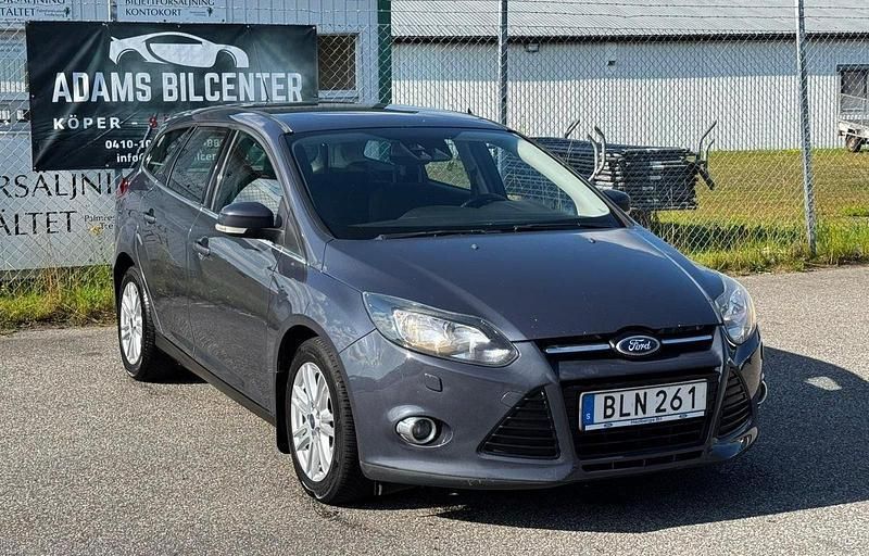 Grå Begagnad 2014 Ford Focus Titanium Kombi | 41 900 kr (Bra pris) - Bild 1/4