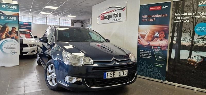 Mörkblå Begagnad 2008 Citroën C5 Kombi | 49 900 kr (Marknadspris) - Bild 1/4