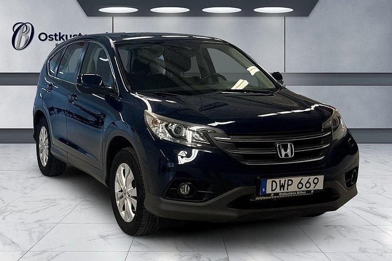 Mörkblå (blå) Begagnad 2014 Honda CR-V SUV | 149 900 kr (Marknadspris) - Bild 1/4