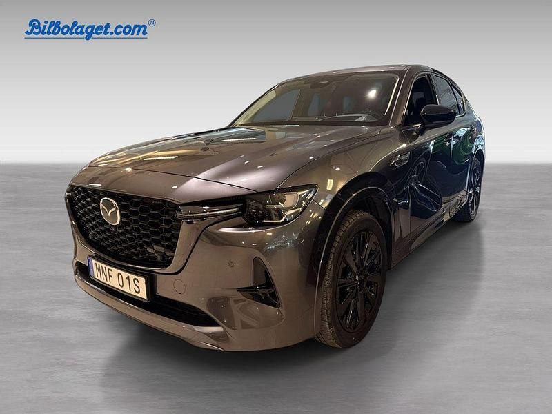Grå Begagnad 2023 Mazda CX-60 Homura-Line SUV | 449 000 kr (Marknadspris) - Bild 1/4