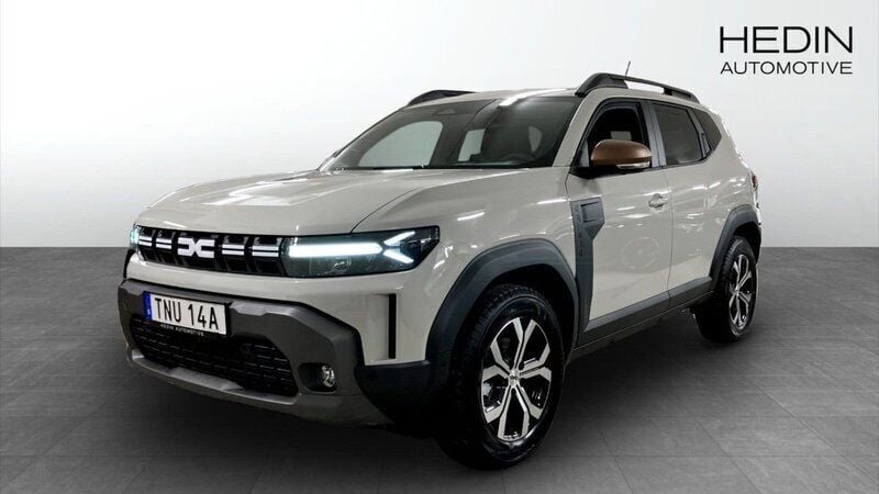 Brun (brown) Begagnad 2024 Dacia Duster Extreme SUV | 314 900 kr (Marknadspris) - Bild 1/4