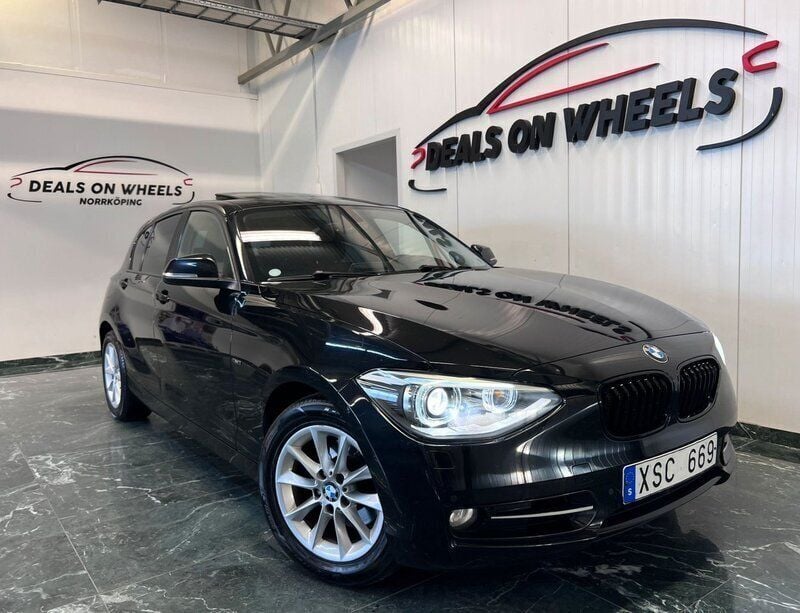 Svart Begagnad 2012 BMW 120 Sport Line Halvkombi | 109 900 kr (Bra pris) - Bild 1/4