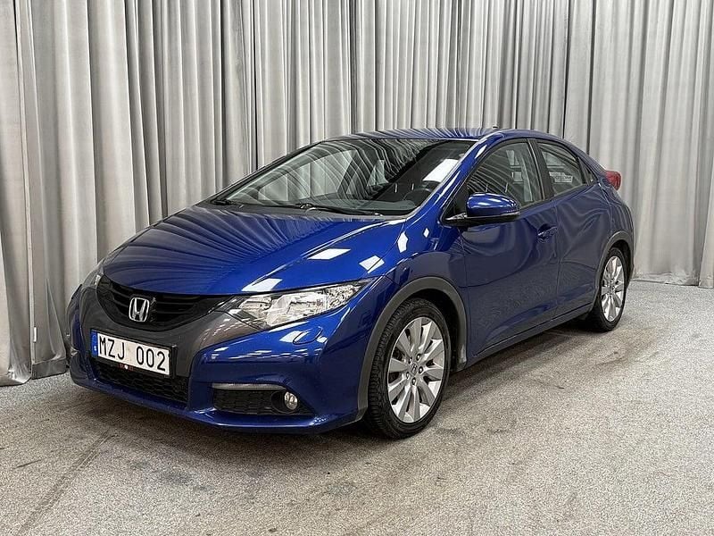 Blå metallic Begagnad 2012 Honda Civic Sport Halvkombi | 69 900 kr (Marknadspris) - Bild 1/4
