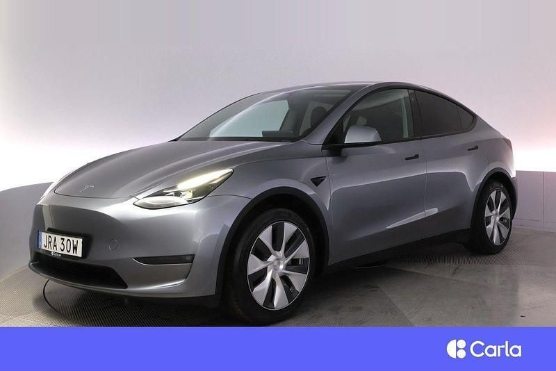 Grå Begagnad 2023 Tesla Model Y Long Range SUV | 444 900 kr (Bra pris) - Bild 1/4