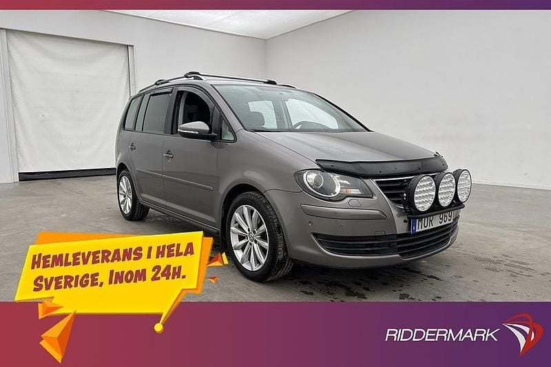 Mgrå Begagnad 2009 VW Touran Freestyle Minibuss | 89 800 kr (Dyr) - Bild 1/3