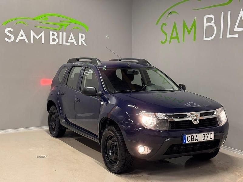 Blå Begagnad 2012 Dacia Duster SUV | 74 900 kr (Marknadspris) - Bild 1/4