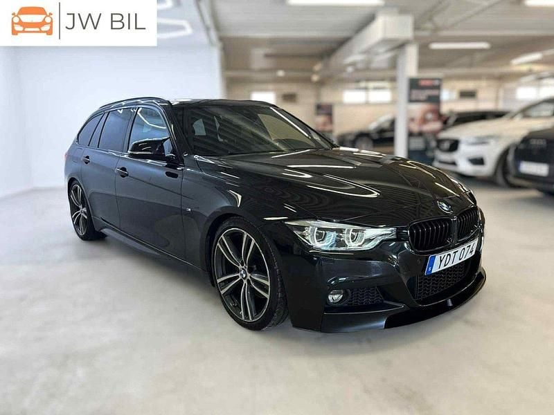 Svart Begagnad 2016 BMW 330 M Sport Kombi | 264 900 kr (Marknadspris) - Bild 1/4