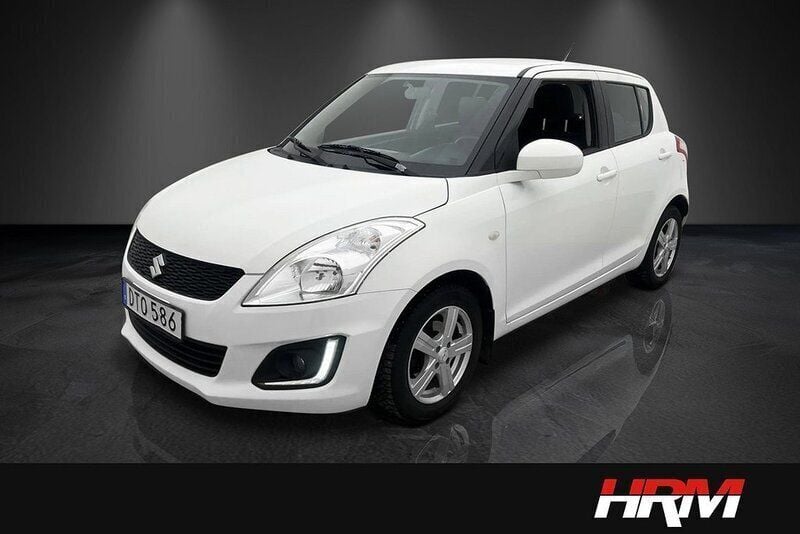 Vit Begagnad 2016 Suzuki Swift Comfort Halvkombi | 109 900 kr (Marknadspris) - Bild 1/4