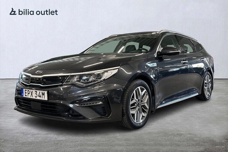 Grå Begagnad 2018 Kia Optima Hybrid 2 Sedan | 189 900 kr (Marknadspris) - Bild 1/4
