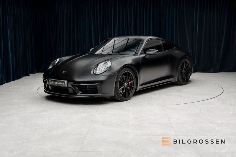Mörkblå Begagnad 2020 Porsche 911 Carrera 4S Sport Sportkupé | 1 449 900 kr (Bra pris) - Bild 1/4