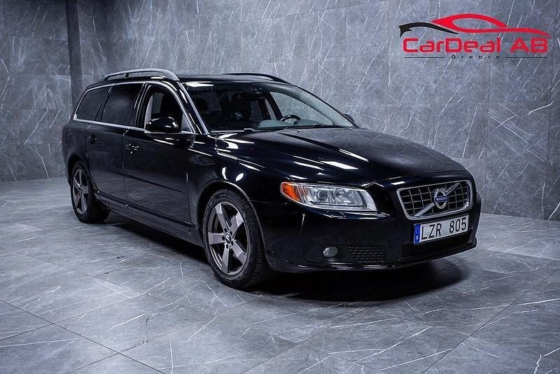 Svart Begagnad 2011 Volvo V70 Momentum Kombi | 68 800 kr (Marknadspris) - Bild 1/4