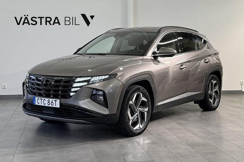 Brun Begagnad 2022 Hyundai Tucson Advanced SUV | 324 900 kr (Marknadspris) - Bild 1/4