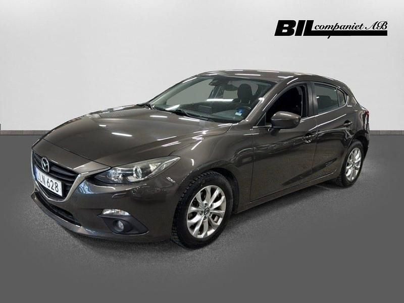 Brun Begagnad 2014 Mazda 3 Inclusive Halvkombi | 129 000 kr (Marknadspris) - Bild 1/4