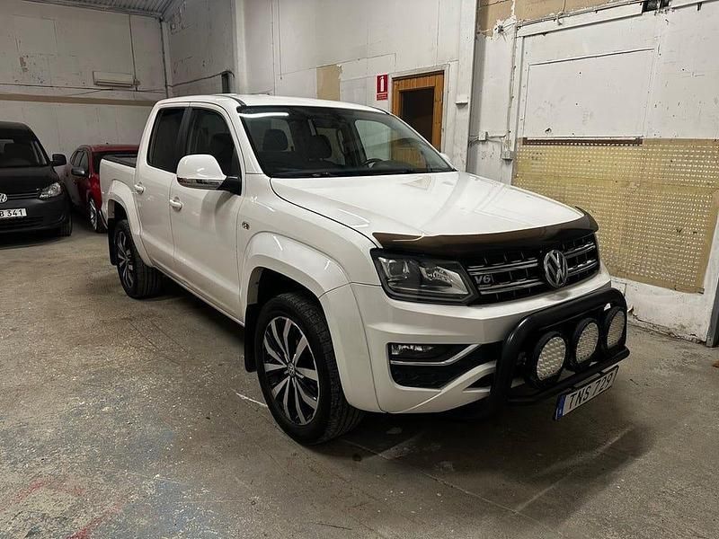 Vit Begagnad 2017 VW Amarok Highline Pickup | 189 500 kr (Dyr) - Bild 1/4