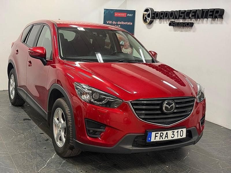 Röd Begagnad 2015 Mazda CX-5 SUV | 129 900 kr (Marknadspris) - Bild 1/4