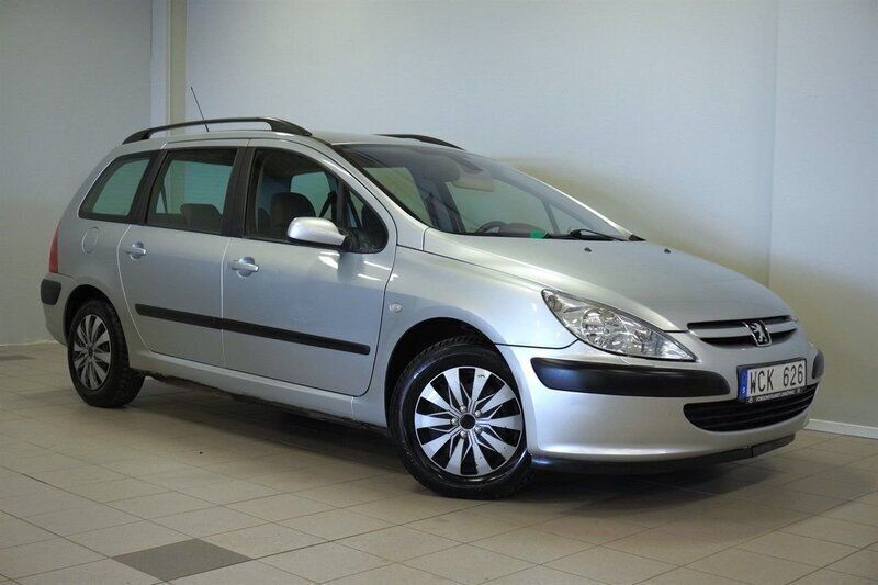 Ljusgrå (grå) Begagnad 2004 Peugeot 307 Kombi | 27 900 kr (Marknadspris) - Bild 1/4