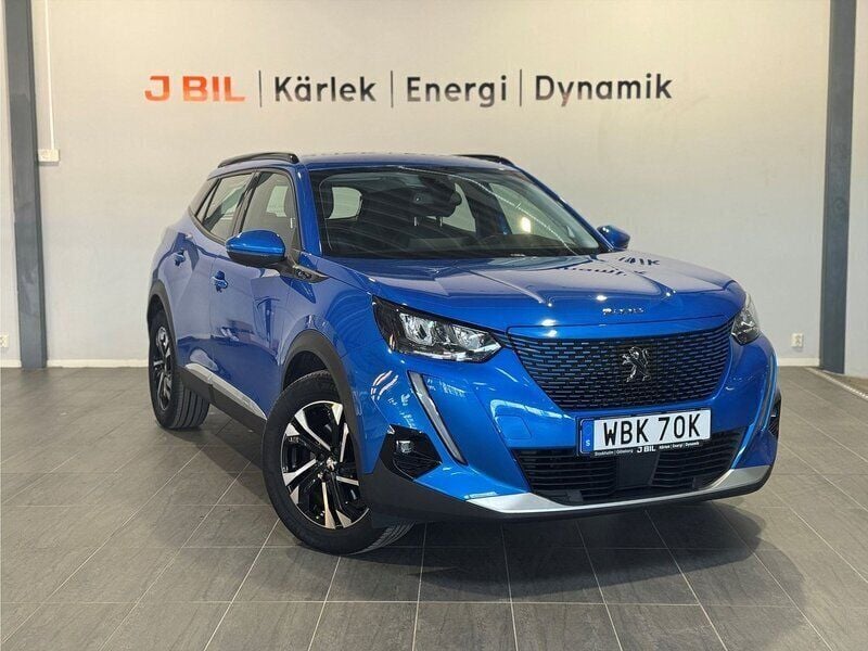 Blå Begagnad 2020 Peugeot e-2008 Allure SUV | 174 800 kr (Marknadspris) - Bild 1/4