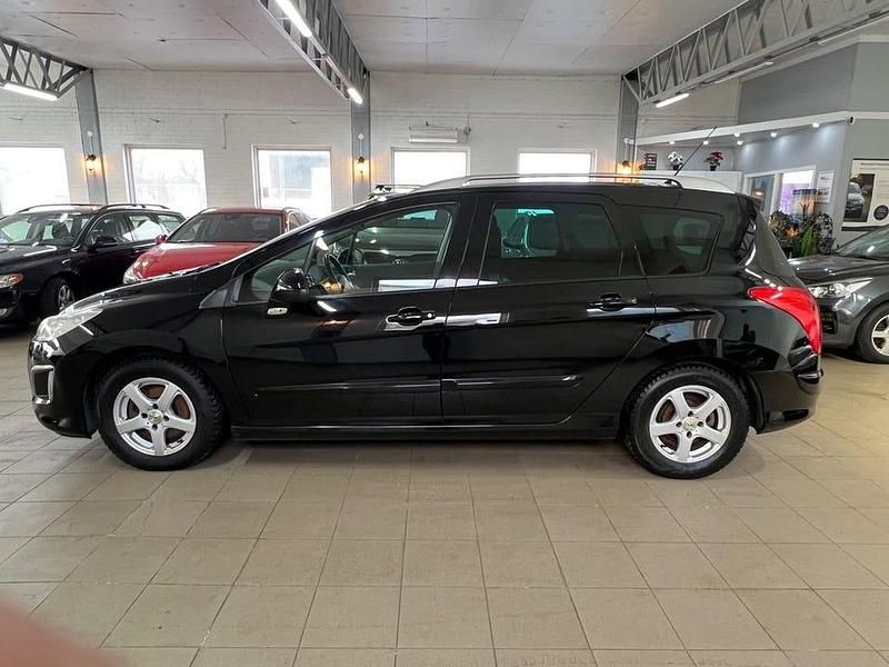 Begagnad Peugeot 308 SW 112 HK (82 kW) 2012 Svart Kombi