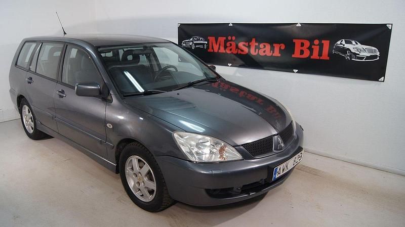 Mörkgrå Begagnad 2006 Mitsubishi Lancer Kombi | 23 900 kr (Lite dyr) - Bild 1/4