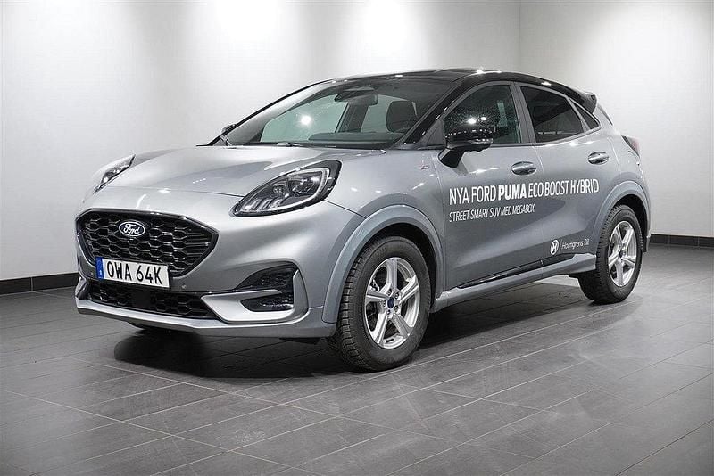 Grå (solar silver metallic) Begagnad 2024 Ford Puma Gen-E ST-Line X SUV | 289 900 kr - Bild 1/4