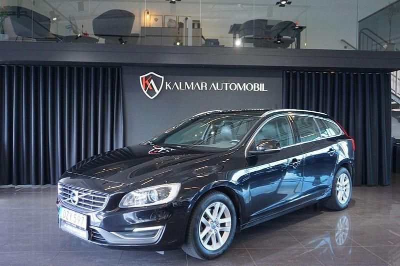 Svart Begagnad 2014 Volvo V60 Summum Kombi | 139 900 kr (Marknadspris) - Bild 1/4