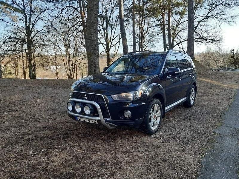 Begagnad Mitsubishi Outlander Comfort Edition 156 HK (114 kW) 2012 Svart SUV