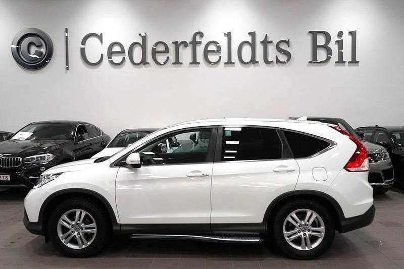 Vit Begagnad 2014 Honda CR-V Executive SUV | 189 900 kr (Lite dyr) - Bild 1/4