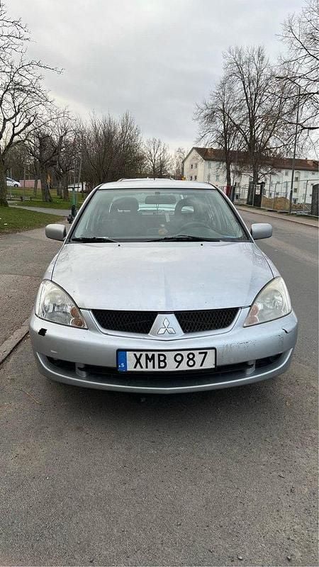 Silver Begagnad 2006 Mitsubishi Lancer Sedan | 18 000 kr (Marknadspris) - Bild 1/4