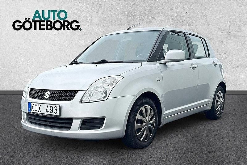 Grå Begagnad 2009 Suzuki Swift Halvkombi | 49 900 kr (Dyr) - Bild 1/3
