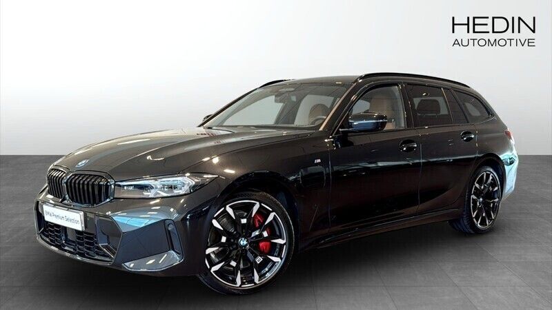 Svart Begagnad 2024 BMW 330e Shadowline Kombi | 638 700 kr (Dyr) - Bild 1/4