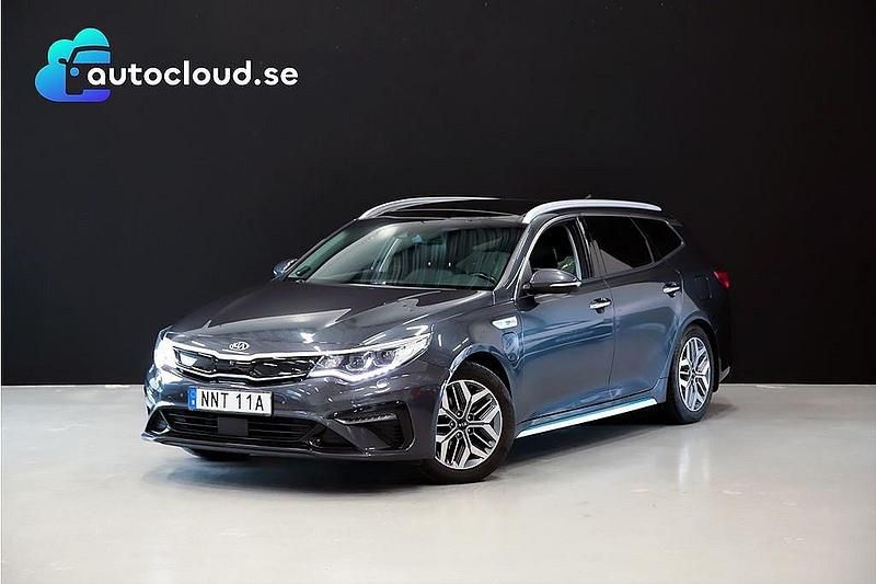 Grå Begagnad 2018 Kia Optima Hybrid 2 Sedan | 199 800 kr (Marknadspris) - Bild 1/4