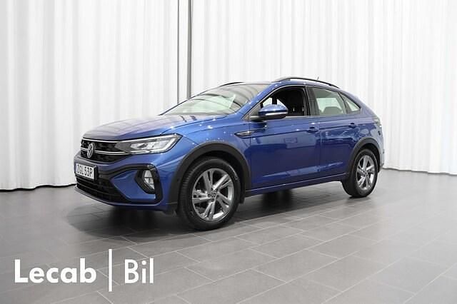 Blå (reef blue metallic) Begagnad 2024 VW Taigo R-line SUV | 244 500 kr (Marknadspris) - Bild 1/4