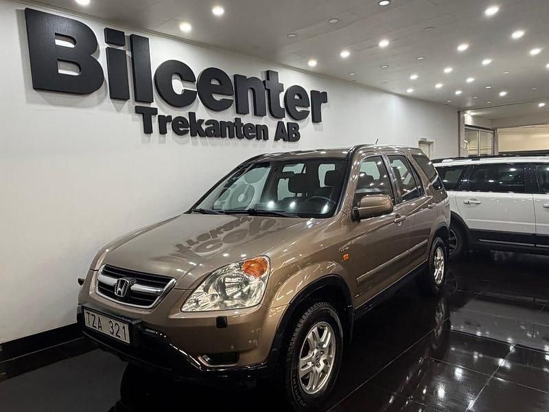 Ljusbrun Begagnad 2003 Honda CR-V SUV | 39 900 kr (Marknadspris) - Bild 1/4