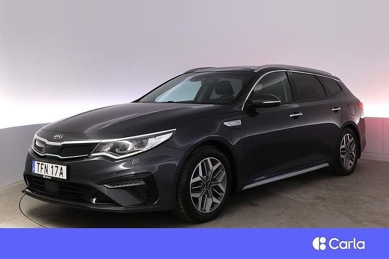 Grå Begagnad 2019 Kia Optima Hybrid Advance Sedan | 224 700 kr (Marknadspris) - Bild 1/4
