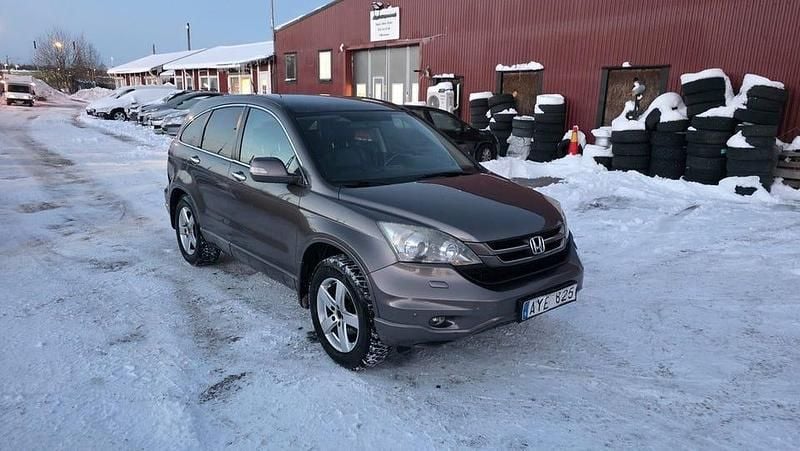 Grå Begagnad 2011 Honda CR-V Executive SUV | 54 900 kr (Superpris) - Bild 1/4