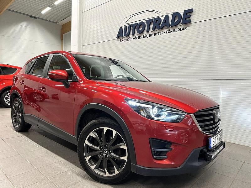 Röd Begagnad 2017 Mazda CX-5 Optimum SUV | 169 900 kr (Marknadspris) - Bild 1/4
