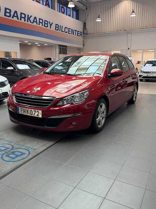 Mörkröd Begagnad 2014 Peugeot 308 SW Active Kombi | 74 900 kr (Bra pris) - Bild 1/4