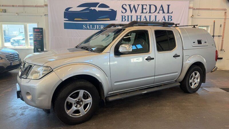 Silver Begagnad 2012 Nissan Navara Pickup | 99 800 kr (Marknadspris) - Bild 1/4