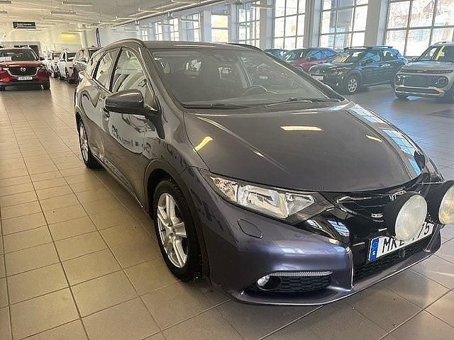 Begagnad Honda Civic Elegance 120 HK (88 kW) 2014 Blå Kombi