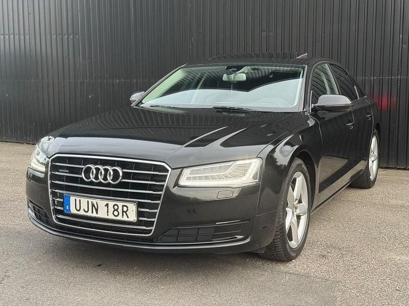 Svart Begagnad 2014 Audi A8 Sedan | 249 700 kr - Bild 1/4