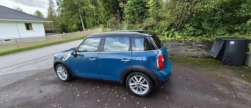Blå Begagnad 2011 Mini Cooper D Countryman Pepper SUV | 75 000 kr (Marknadspris) - Bild 1/4