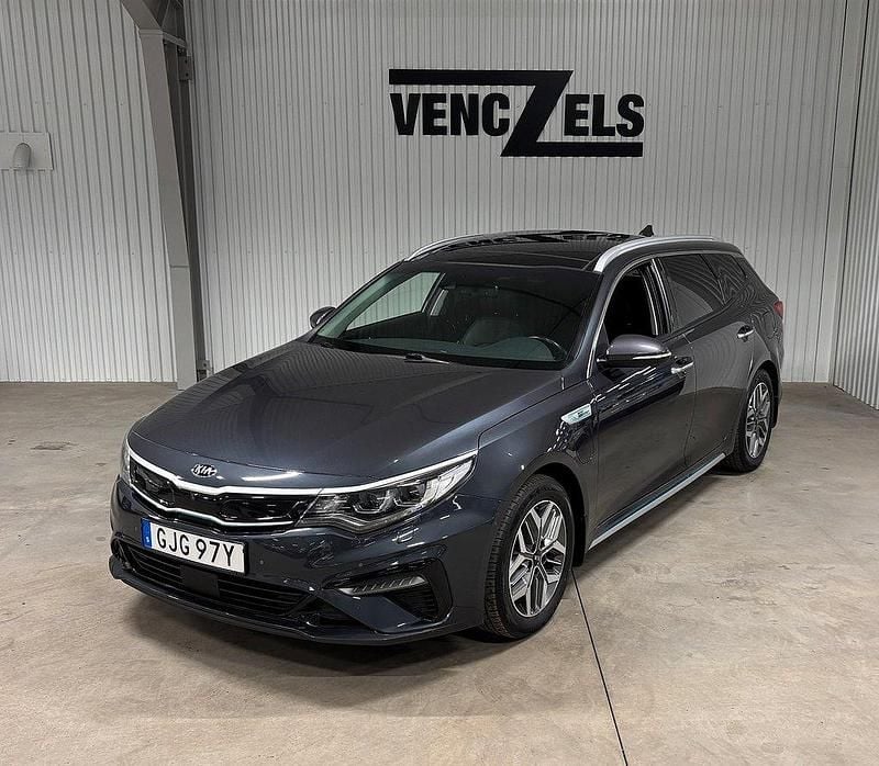 Grå Begagnad 2019 Kia Optima Hybrid Advance Sedan | 234 000 kr (Marknadspris) - Bild 1/4