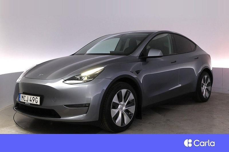 Grå Begagnad 2023 Tesla Model Y Long Range SUV | 519 900 kr - Bild 1/4