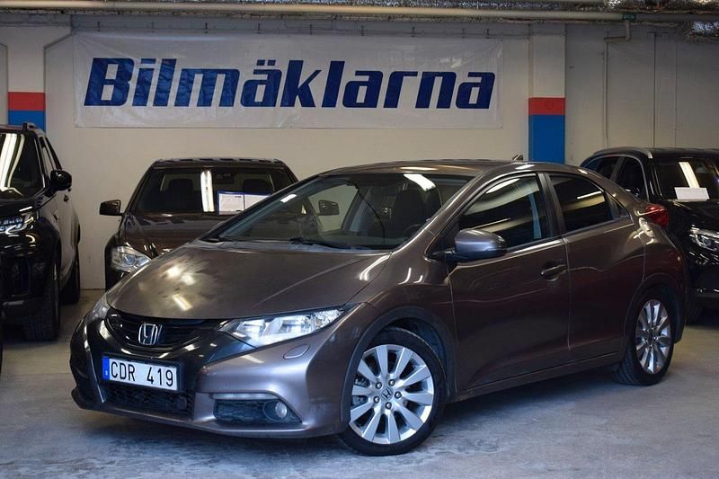 Grå Begagnad 2012 Honda Civic Sport Halvkombi | 59 500 kr (Marknadspris) - Bild 1/4
