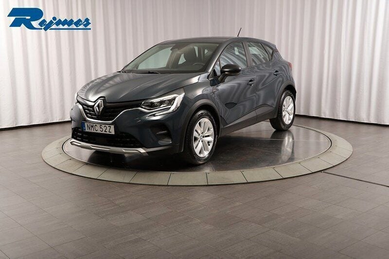 Blå (marinblå smoke solid rpe) Begagnad 2022 Renault Captur Zen SUV | 179 800 kr (Marknadspris) - Bild 1/4