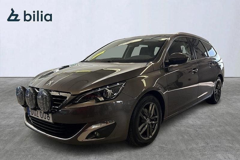 Mörkgrå (grå) Begagnad 2014 Peugeot 308 Kombi | 109 500 kr (Marknadspris) - Bild 1/4
