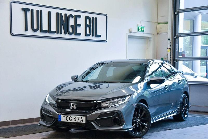 Mörkgrå Begagnad 2019 Honda Civic Comfort Halvkombi | 179 900 kr (Lite dyr) - Bild 1/4