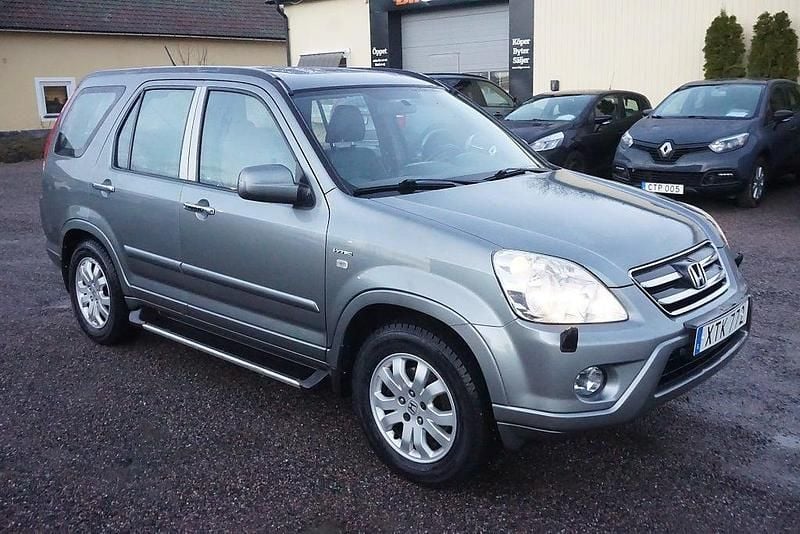 Grå Begagnad 2006 Honda CR-V SUV | 54 900 kr (Marknadspris) - Bild 1/4